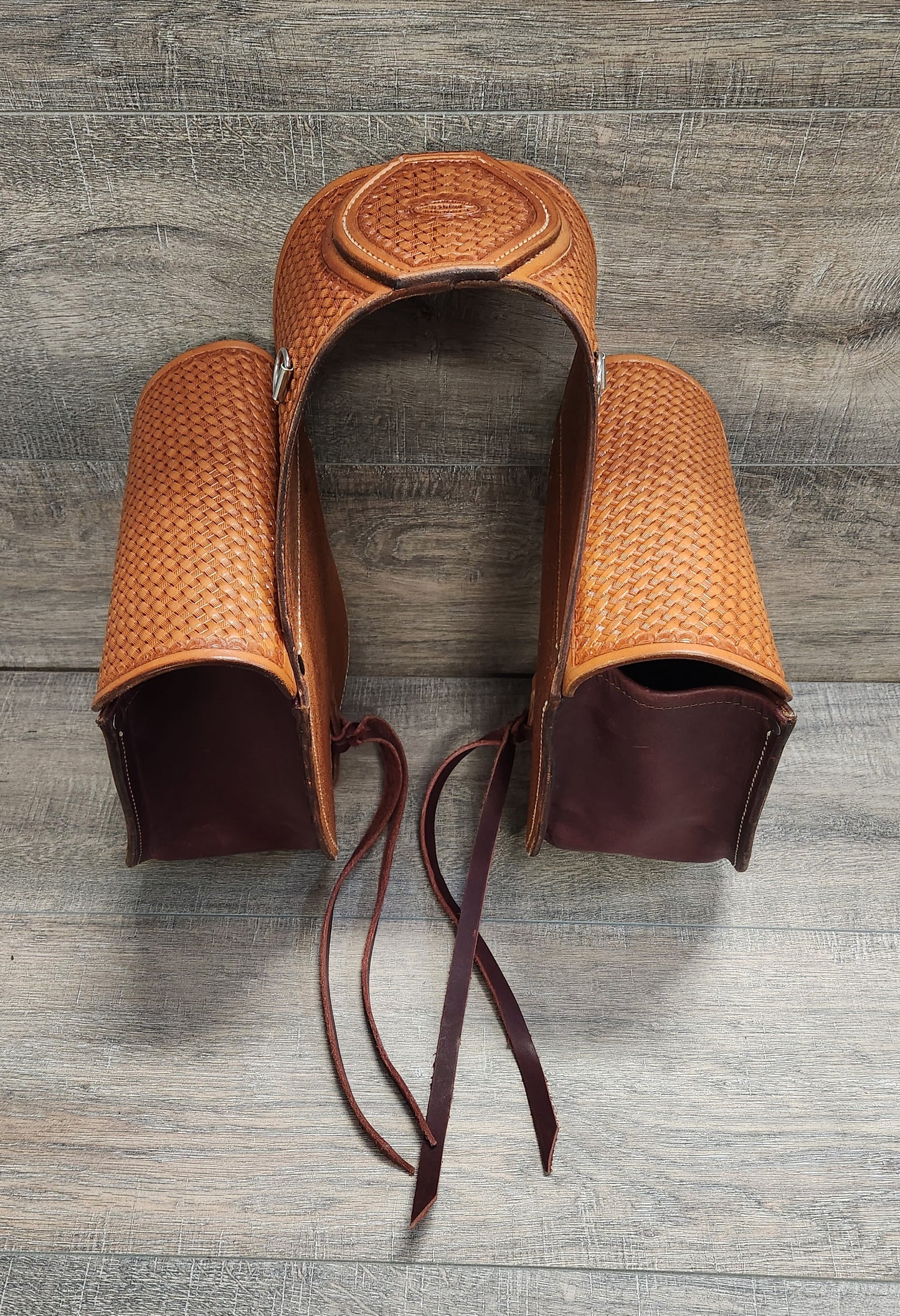 Leather Saddle Bag with Basket Weave Tooling in a Tan Finish