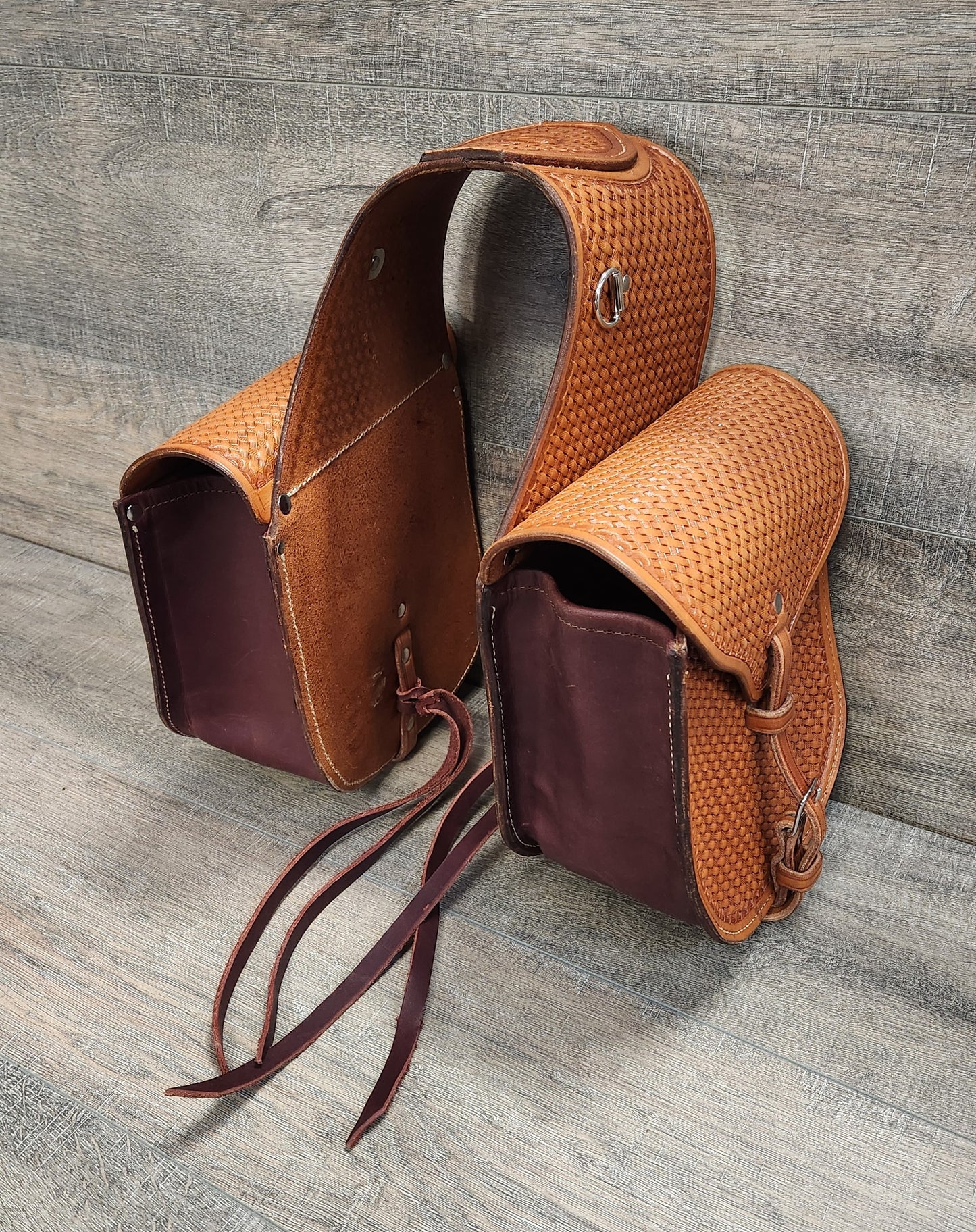 Leather Saddle Bag with Basket Weave Tooling in a Tan Finish