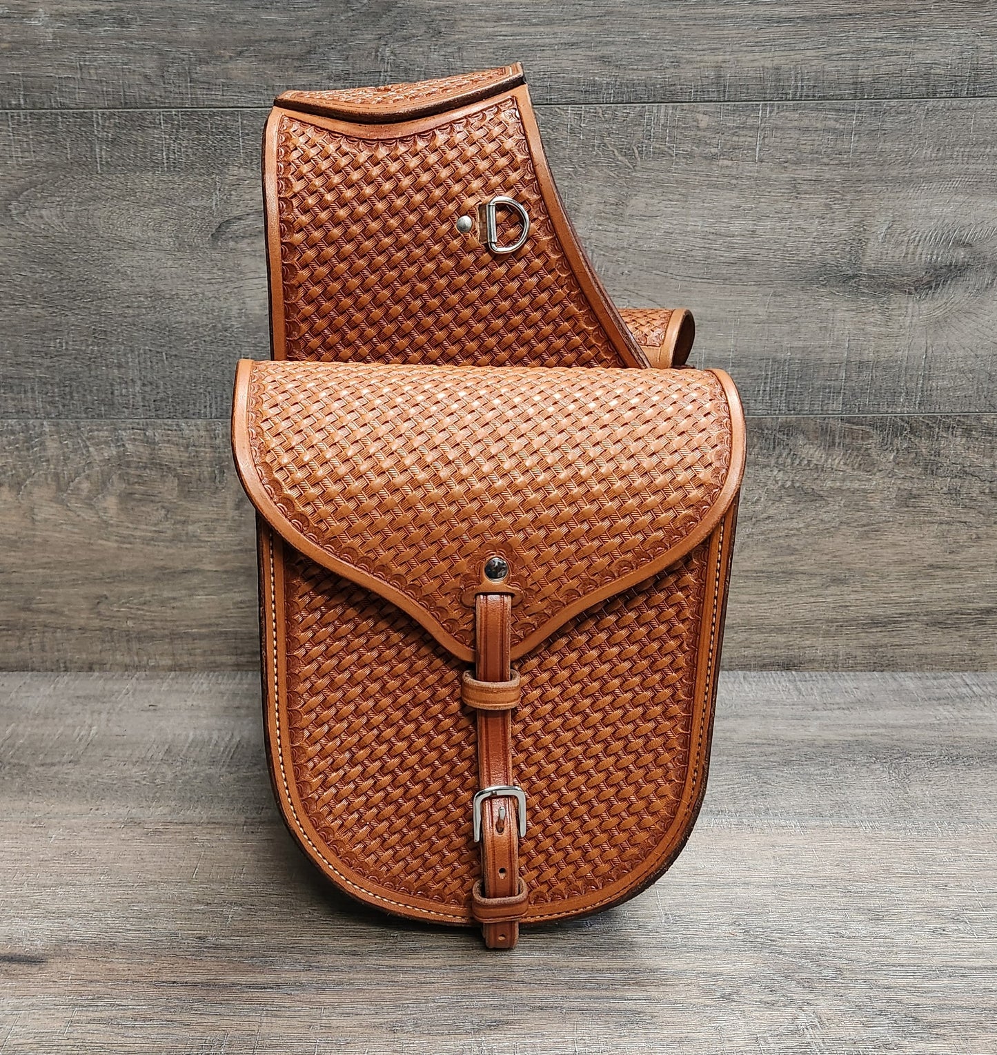 Leather Saddle Bag with Basket Weave Tooling in a Tan Finish