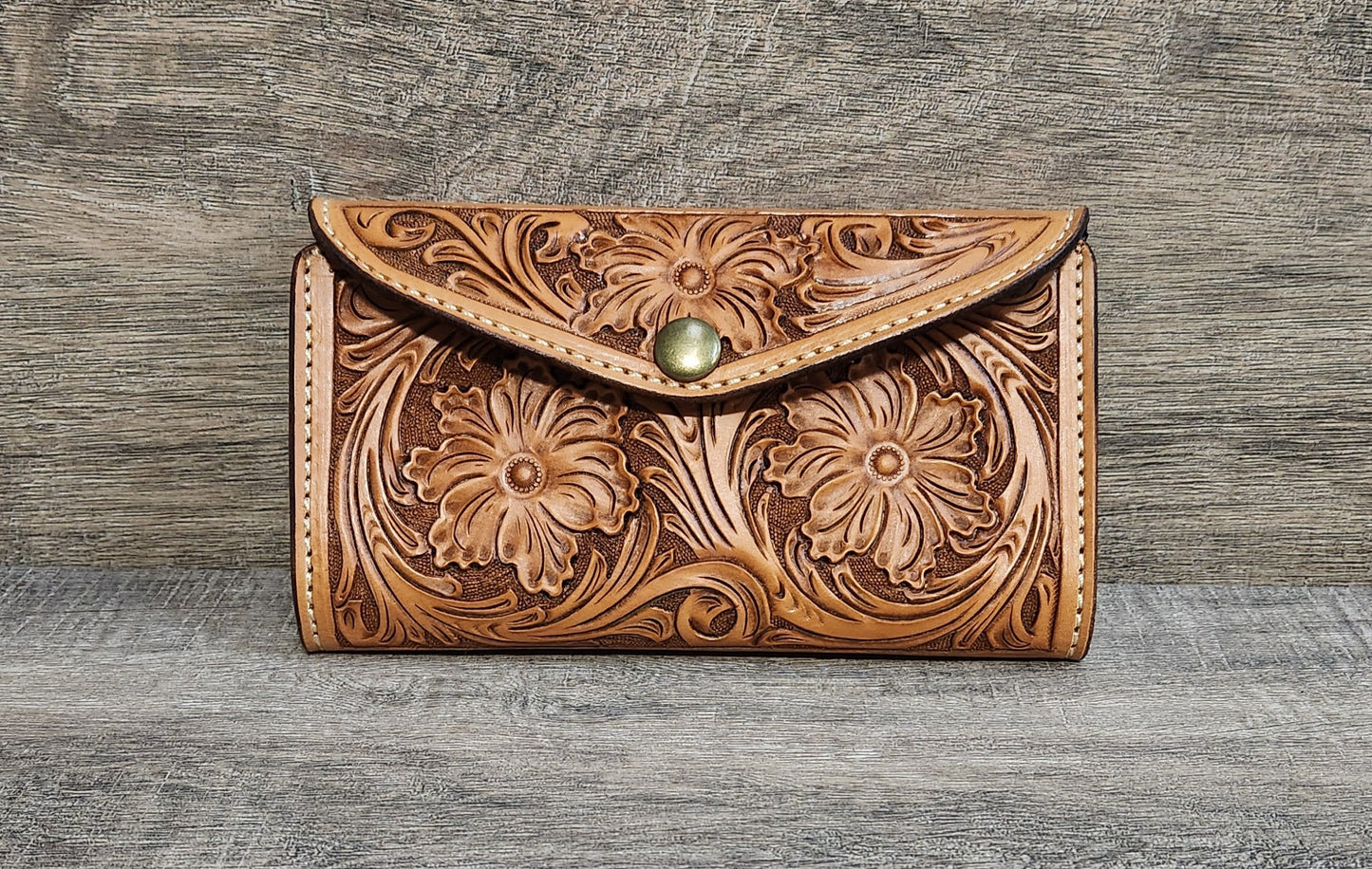 Women's Clutch Wallet with Floral Tooling in an Antique Tan Finish