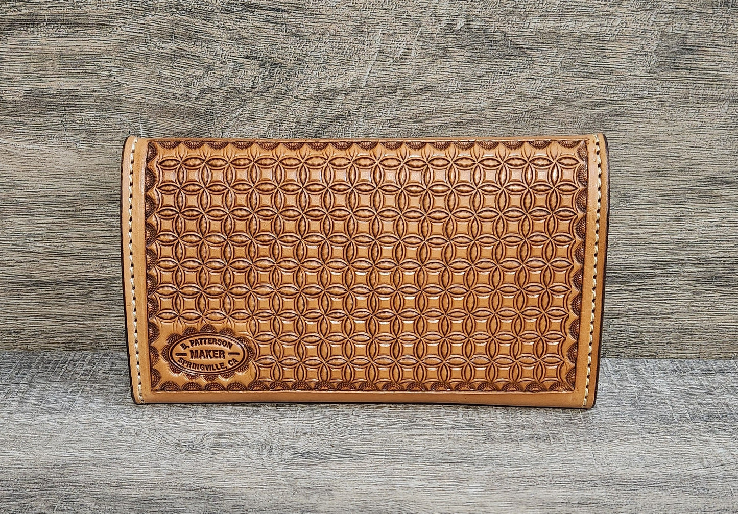 Women's Clutch Wallet with Floral Tooling in an Antique Tan Finish