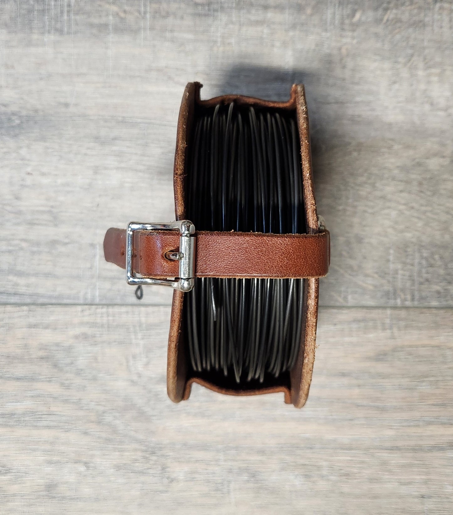 Leather Wire Roll Holder in a Brown Finish